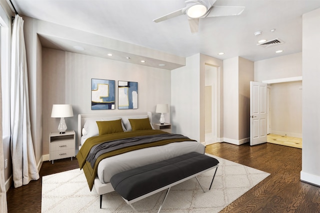 bedroom featuring dark hardwood / wood-style flooring and ceiling fan