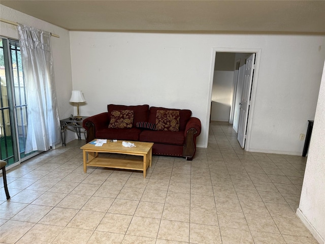 living room with light tile patterned flooring