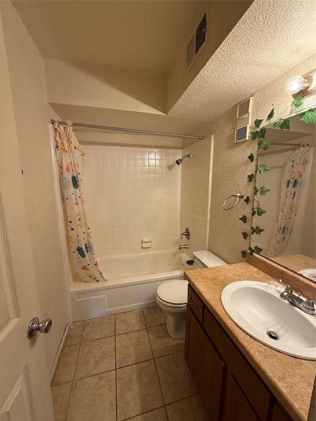 full bathroom featuring a textured ceiling, vanity, toilet, shower / bathtub combination with curtain, and tile patterned floors