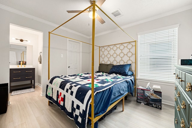 bedroom with crown molding, ceiling fan, a closet, and light wood-type flooring