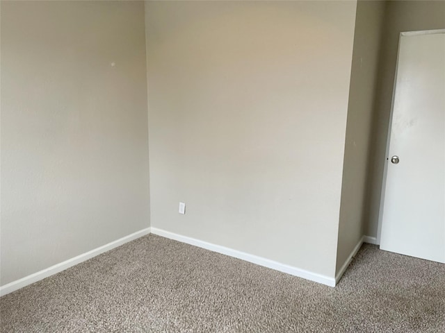 empty room featuring carpet