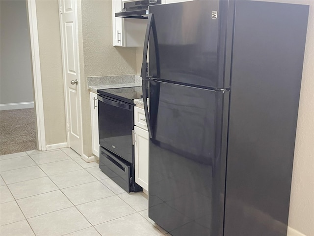 kitchen featuring white cabinetry, black appliances, and light tile patterned flooring