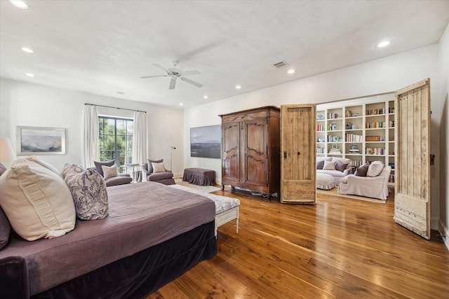 bedroom featuring hardwood / wood-style flooring and ceiling fan