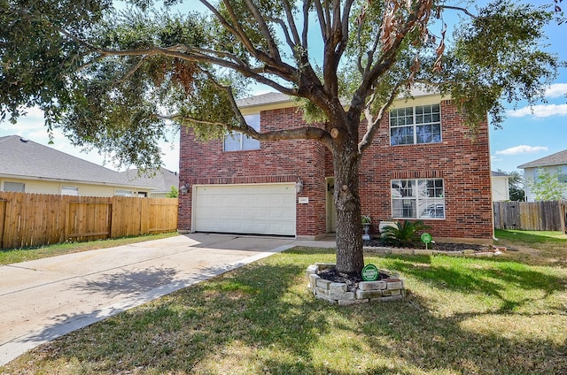 view of front of house featuring a garage and a front yard