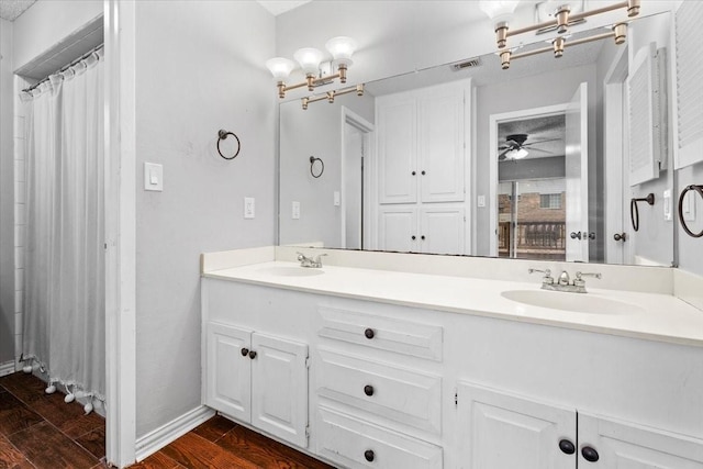 bathroom featuring vanity and wood-type flooring