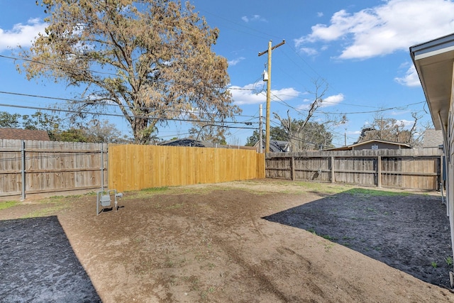 view of yard featuring a fenced backyard