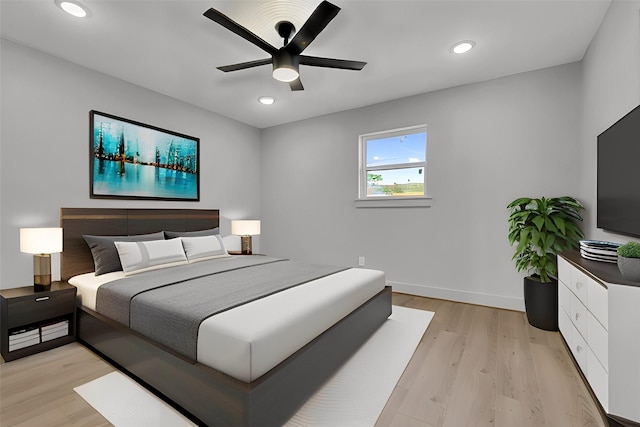 bedroom featuring baseboards, ceiling fan, recessed lighting, and light wood-style floors