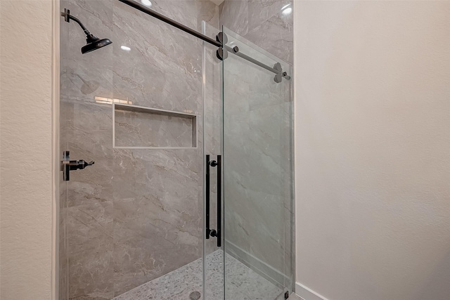 bathroom with an enclosed shower