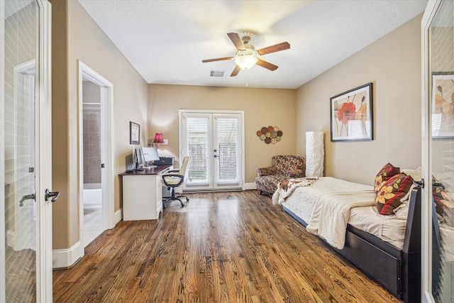 bedroom with dark wood-type flooring, french doors, ceiling fan, and access to outside