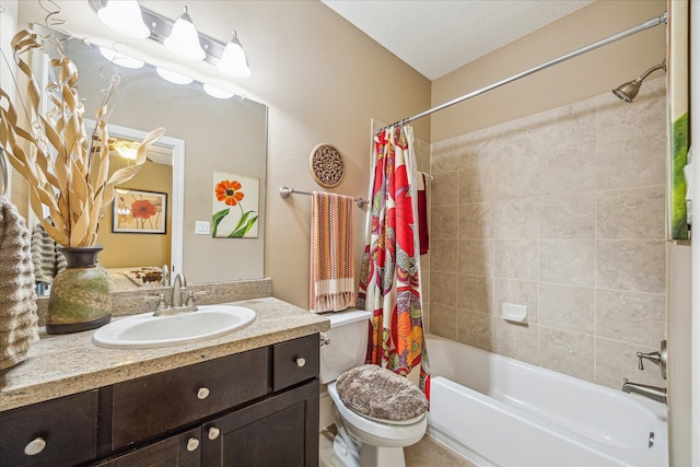 full bathroom featuring vanity, a textured ceiling, toilet, and shower / bath combo with shower curtain