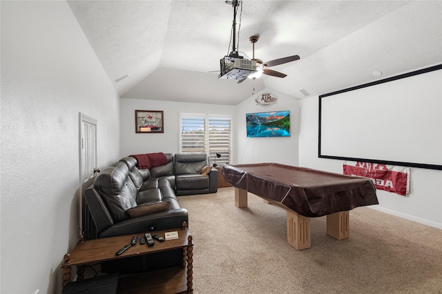 home theater featuring lofted ceiling, ceiling fan, carpet flooring, a textured ceiling, and pool table