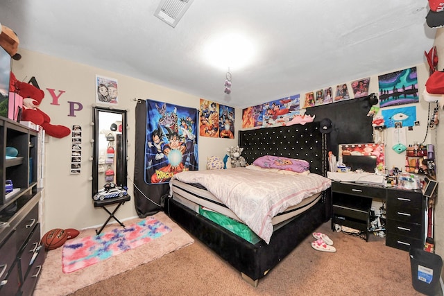 carpeted bedroom with visible vents