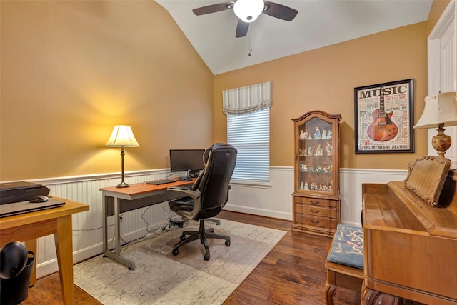 office space with vaulted ceiling, dark wood-type flooring, and ceiling fan