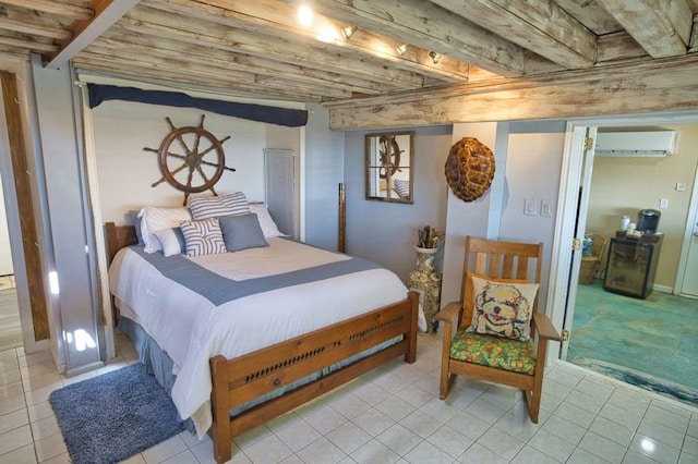 tiled bedroom featuring beam ceiling and a wall unit AC