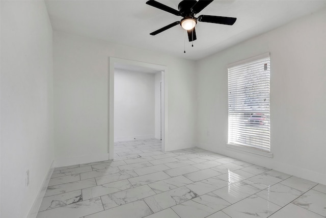 unfurnished room featuring ceiling fan