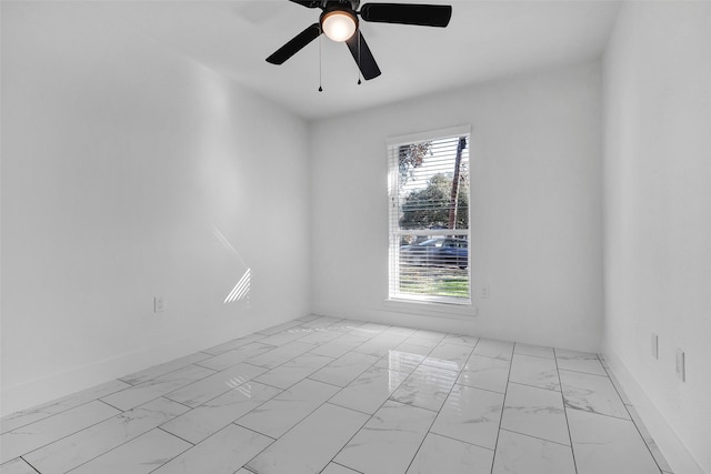 unfurnished room with ceiling fan