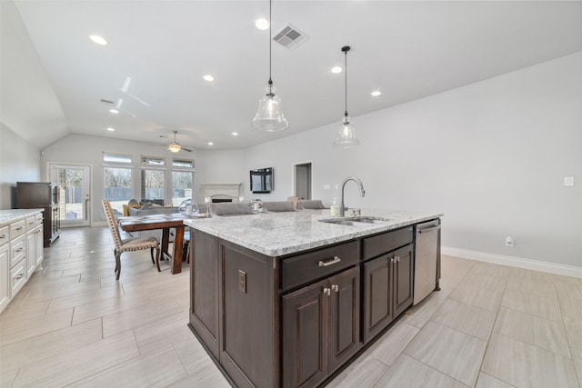 kitchen featuring dishwasher, sink, white cabinets, hanging light fixtures, and dark brown cabinets