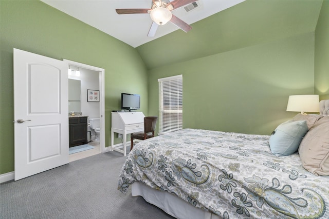 carpeted bedroom with lofted ceiling, ceiling fan, and ensuite bathroom