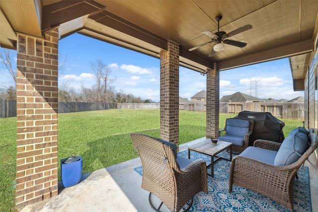 view of patio featuring grilling area and ceiling fan