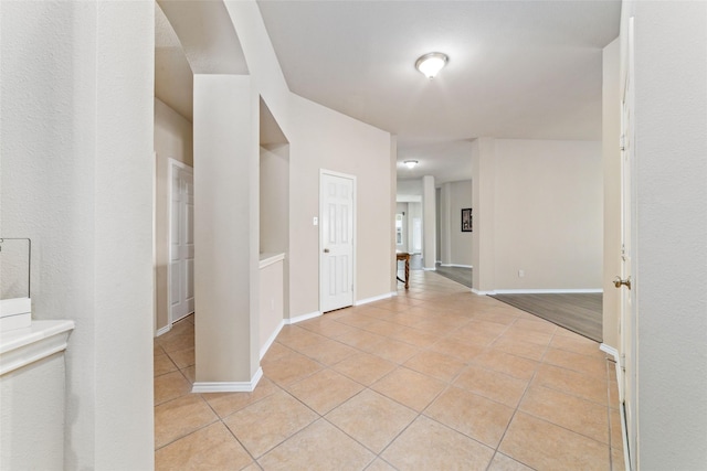 entryway featuring light tile patterned floors