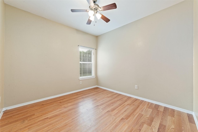 spare room featuring ceiling fan and light hardwood / wood-style flooring