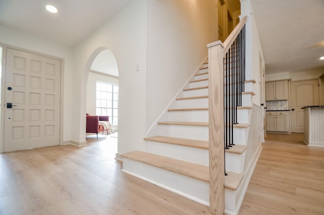 entrance foyer with light hardwood / wood-style flooring