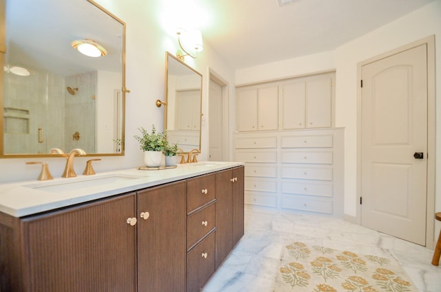 bathroom featuring vanity and an enclosed shower