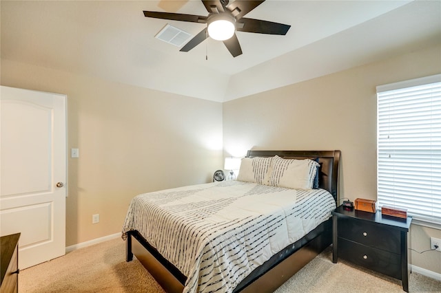 bedroom featuring light colored carpet and ceiling fan