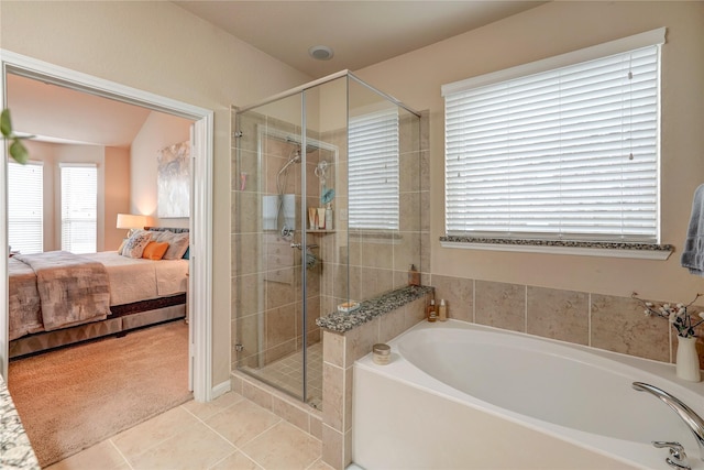 bathroom featuring tile patterned floors and plus walk in shower