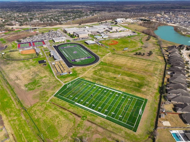 birds eye view of property with a water view