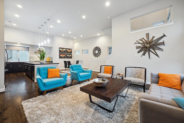 living room with dark wood-type flooring