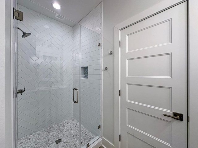 bathroom with an enclosed shower