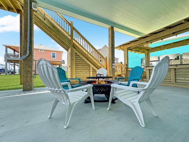 view of patio featuring a fire pit