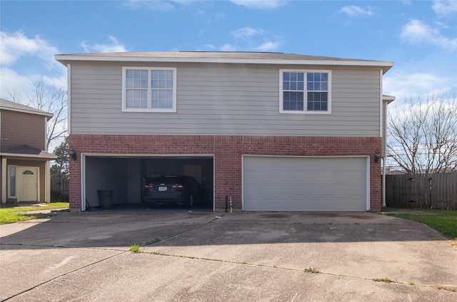 front facade with a garage