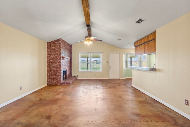 unfurnished living room with a fireplace, lofted ceiling with beams, and ceiling fan