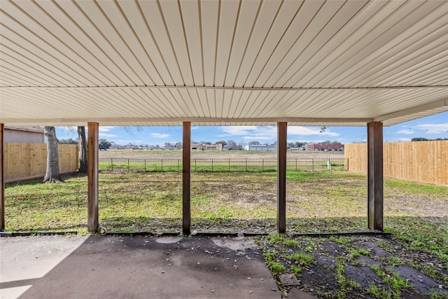 view of yard featuring a patio area and a rural view