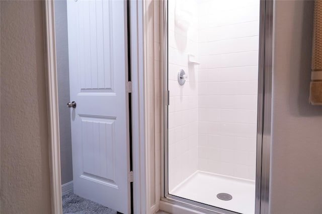 bathroom with an enclosed shower