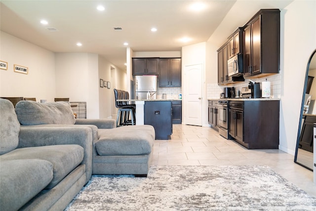 living room featuring light tile patterned floors