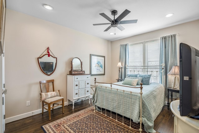 bedroom featuring dark wood-type flooring and ceiling fan