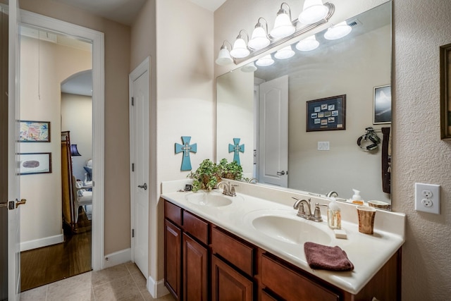 bathroom with vanity and tile patterned floors