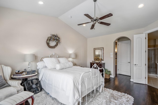 bedroom featuring dark wood-type flooring, ceiling fan, and vaulted ceiling