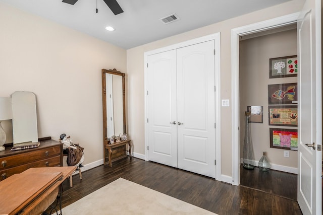 office area featuring dark hardwood / wood-style floors and ceiling fan