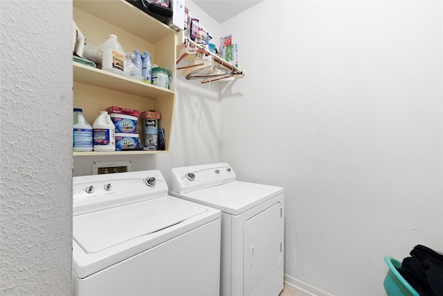 laundry room featuring independent washer and dryer