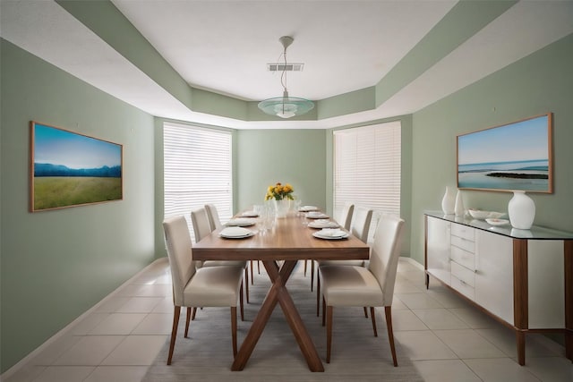 dining area with light tile patterned floors