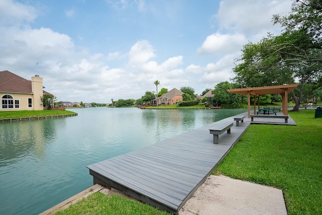 view of dock featuring a water view, a pergola, and a lawn