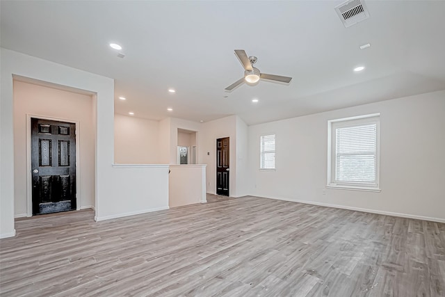 3215 Laurel Bend Ln, Pearland, TX 77584 - unfurnished living room with light wood-style flooring, a ceiling fan, baseboards, and recessed lighting