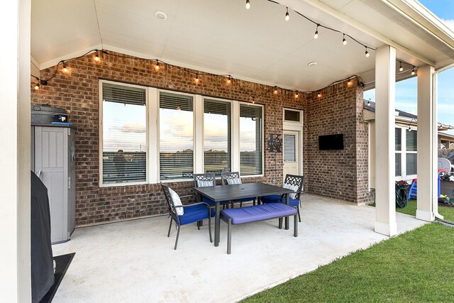 view of patio with outdoor dining area