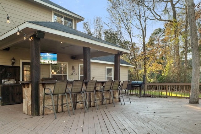 wooden terrace with exterior bar