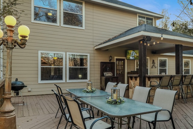 deck featuring an outdoor bar