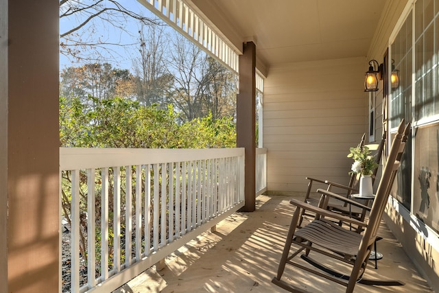 balcony featuring a porch